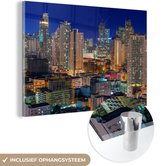 MuchoWow® Glasschilderij 90x60 cm - Schilderij acrylglas - Gekleurde gebouwen in Manila tijdens de avond - Foto op glas - Schilderijen