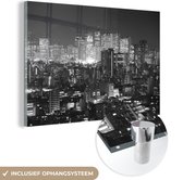 MuchoWow® Glasschilderij 180x120 cm - Schilderij acrylglas - Wolkenkrabber - Zwart - Wit - Nacht - Foto op glas - Schilderijen
