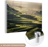 MuchoWow® Glasschilderij 30x20 cm - Schilderij acrylglas - Uitzicht over een zonsondergang - Foto op glas - Schilderijen