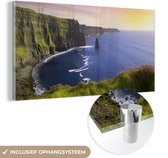MuchoWow® Glasschilderij 80x40 cm - Schilderij acrylglas - Zonlicht op de Kliffen van Moher in Ierland - Foto op glas - Schilderijen