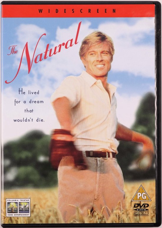 Robert Redford als Roy Hobbs in 'The Natural', staand in een korenveld, met de tekst 'He lived for a dream that wouldn't die.'