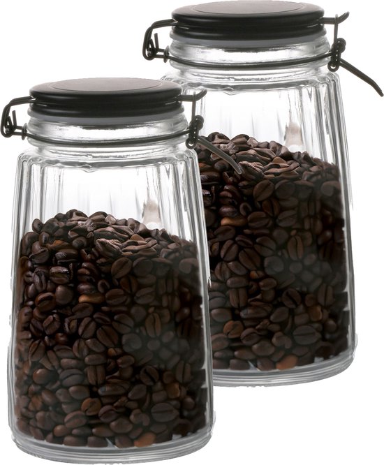 Deux bocaux en verre remplis de grains de café, avec fermetures à levier métalliques noires.