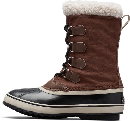 Bruine Sorel winterlaars met zwarte rubberen onderkant en neus, en witte teddy voering.