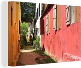 Canvas Schilderij Gekleurde huizen in Senegal - 30x20 cm - Wanddecoratie