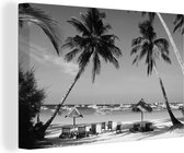 Canvas Schilderij Palmbomen en ligstoelen op het strand van Boracay - zwart wit - 60x40 cm - Wanddecoratie
