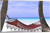 WallClassics - Tuinposter – Hangmat op het Strand - 75x50 cm Foto op Tuinposter  (wanddecoratie voor buiten en binnen)