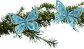 Kerstboom vlinders op clip - 14 cm - 2x stuks - blauw glitter - kunststof