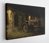 Canvas schilderij - Late autumn evening, an old tractor illuminated by lamps of rural stone buildings  -     1582553461 - 50*40 Horizontal