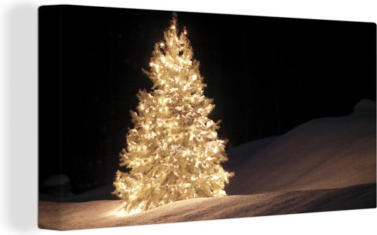 Canvas schilderij 160x80 cm - Wanddecoratie Een verlichtte kerstboom tijdens de nacht - Muurdecoratie woonkamer - Slaapkamer decoratie - Kamer accessoires - Schilderijen - Kerstdecoratie voor Binnen - Kerstdecoratie Woonkamer - Kerstdecoratie in Huis