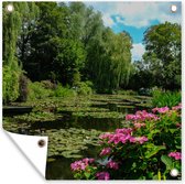 Toile jardin Jour d'été avec nénuphars dans l'eau dans le jardin de Monet en France - 100x100 cm