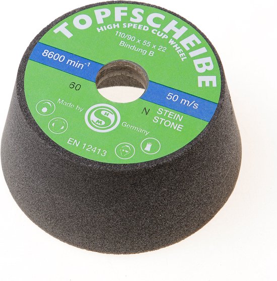 Meule boisseau noire avec étiquette verte. Texte : TOPFSCHEIBE, 8600 min-1, 50 m/s, EN 12413.