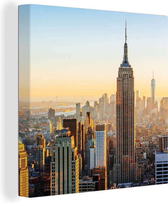 Canvas Schilderij Zonsondergang skyline van New York met het Empire State Building - Wanddecoratie