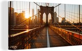 Canvas Schilderij Brooklyn Bridge in New York tijdens zonsondergang - 40x20 cm - Wanddecoratie