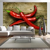 Fotobehang - Spicy chili peppers.