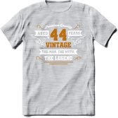 44 Jaar Legend T-Shirt | Goud - Wit | Grappig Verjaardag en Feest Cadeau Shirt | Dames - Heren - Unisex | Tshirt Kleding Kado | - Licht Grijs - Gemaleerd - M