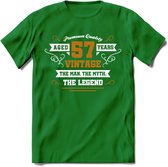57 Jaar Legend T-Shirt | Goud - Wit | Grappig Verjaardag en Feest Cadeau Shirt | Dames - Heren - Unisex | Tshirt Kleding Kado | - Donker Groen - XL