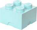 Lichtblauwe Lego opbergbox met vier noppen.