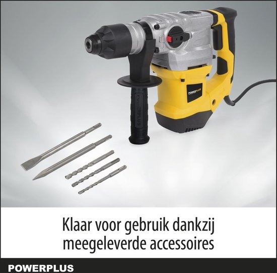 Grijze en gele Powerplus klopboormachine met diverse accessoires, klaar voor gebruik.