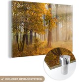 MuchoWow® Glasschilderij 90x60 cm - Schilderij acrylglas - Herfstbomen in het mistige bos - Foto op glas - Schilderijen
