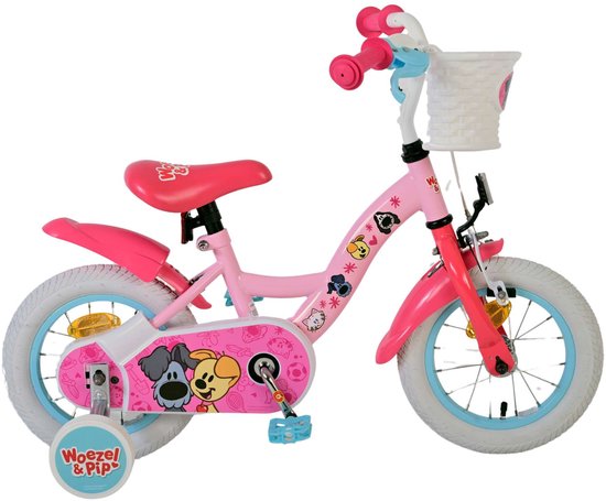 Roze kinderfiets met "Woezel & Pip" afbeeldingen, witte mand en zijwieltjes.