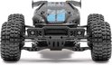 Vooraanzicht van zwarte RC monster truck met grote off-road banden en blauwe accenten op de motorkap.