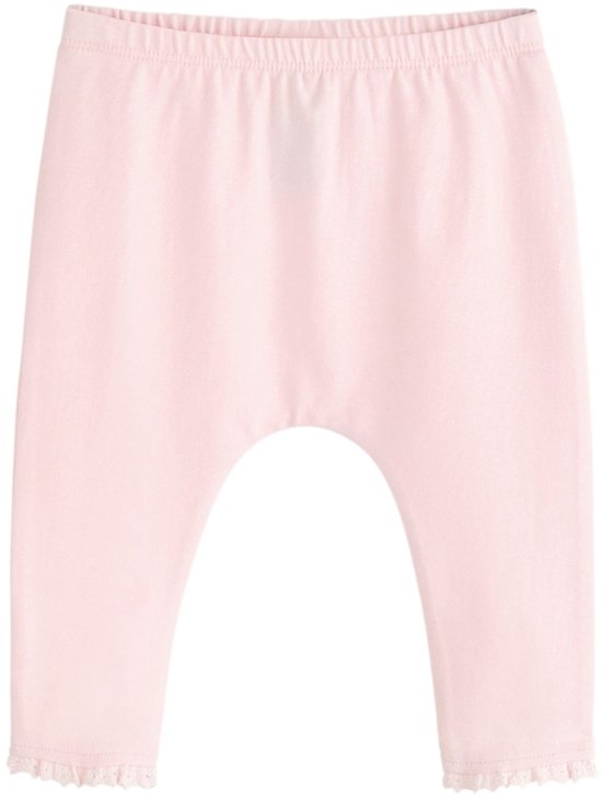 Legging in zachtroze met kanten randjes aan de onderkant.