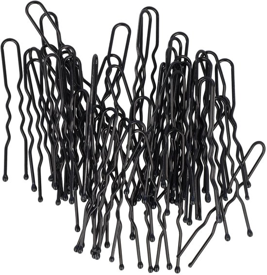 Een hoop zwarte metalen haarspelden, met golvende en rechte vormen, in verschillende hoeken weergegeven.
