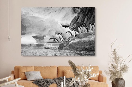 Tableau sur toile Pingouins en Antarctique plongeant dans l'eau - noir et blanc - 150x100 cm - Décoration murale