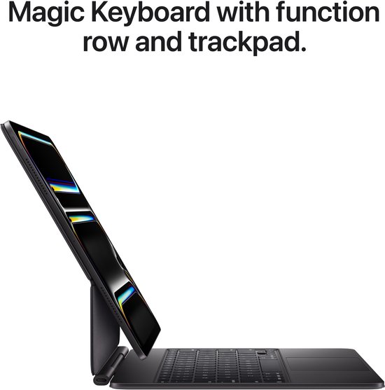 Zijaanzicht van een iPad Pro bevestigd aan een Magic Keyboard met trackpad en functierij.