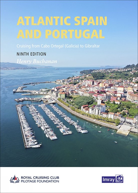 Boekcover 'Atlantic Spain and Portugal', negende editie, van Henry Buchanan. Met een luchtfoto van een jachthaven met boten en een kustplaats.