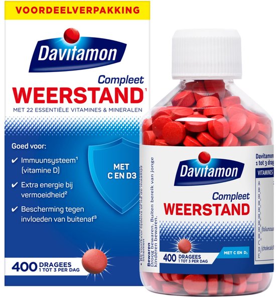 Glazen pot met 400 rode Davitamon Compleet Weerstand pillen. De pot zit naast de kartonnen verpakking.