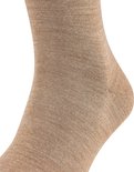 Gros plan d'une chaussette Falke marron, avec de fines côtes.