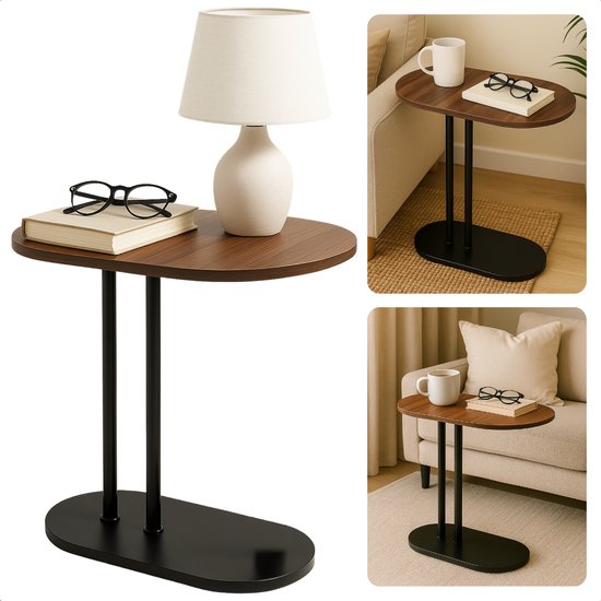 Bruine bijzettafel met ovaal MDF blad en zwarte metalen poten, met lamp, boek en bril.