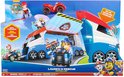 De verpakking van de PAW Patrol Launch & Rescue Patroller toont het voertuig met geopende vleugels en lanceerders, Ryder en de rode ATV.