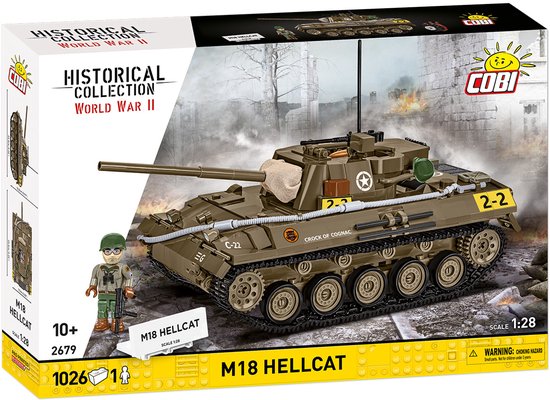 Bouwpakket van een M18 Hellcat tank destroyer, bruin met witte sterren, nummer 2-2, met soldaat, op een achtergrond van vuur en rook.