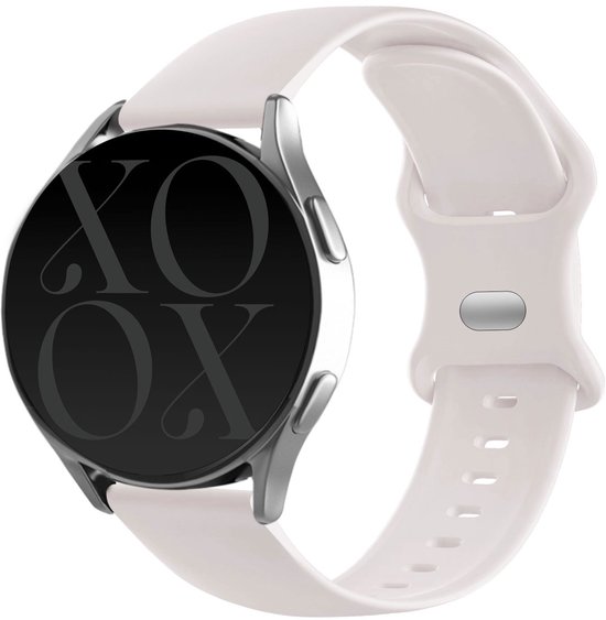 Smartwatch met een beige siliconen bandje en een zwart scherm met 'XOXO' tekst.