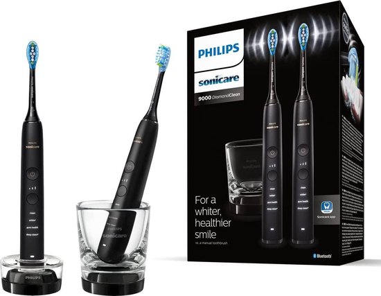 Zwarte Philips Sonicare 9000 DiamondClean tandenborstels op oplaadbasis, in glas en verpakking met 'For a whiter, healthier smile'.