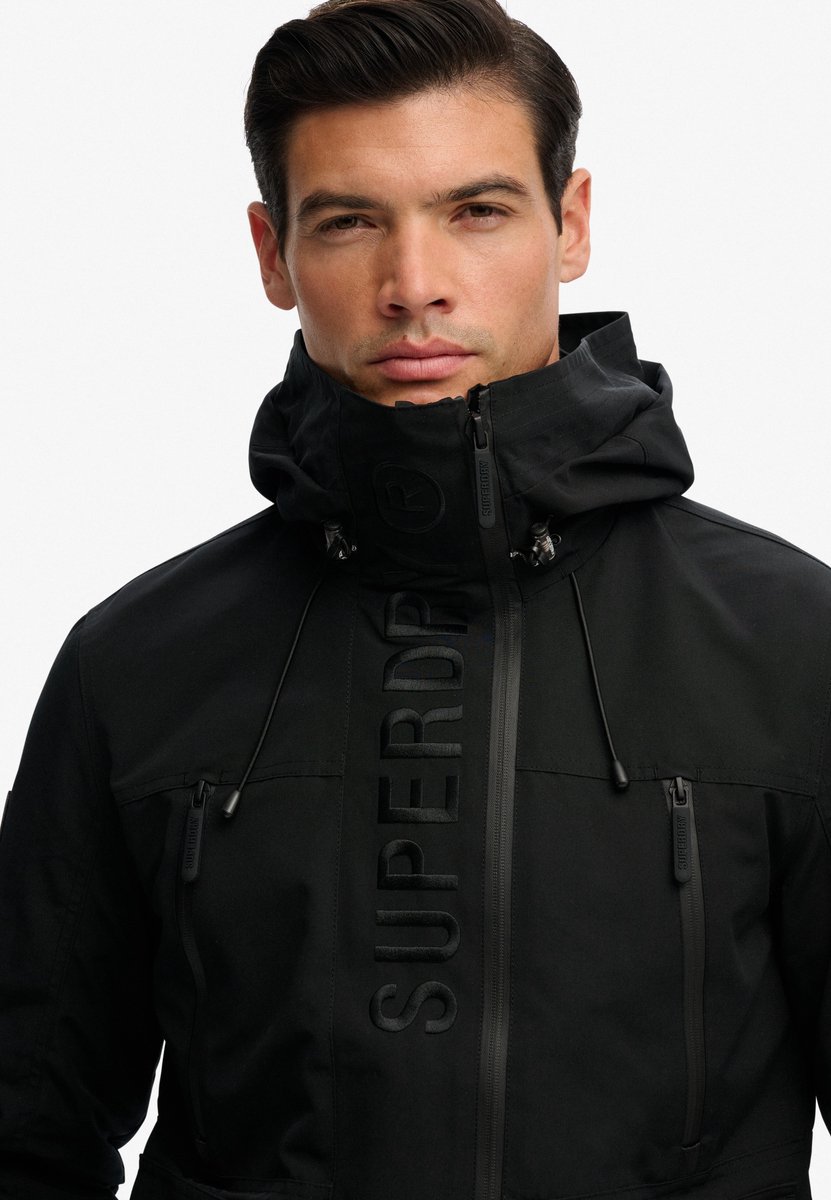 Superdry Ultimate Geborduurd Windbreaker Jack met Capuchon Heren Zwart