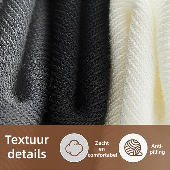 Close-up van de zachte, comfortabele en anti-pilling stof van de beenwarmers in grijs, zwart en wit.