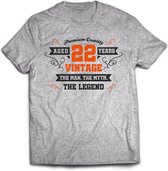 22 Jaar Legend - Feest kado T-Shirt Heren / Dames - Antraciet Grijs / Oranje - Perfect Verjaardag Cadeau Shirt - grappige Spreuken, Zinnen en Teksten. Maat L