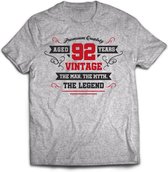 92 Jaar Legend - Feest kado T-Shirt Heren / Dames - Antraciet Grijs / Rood - Perfect Verjaardag Cadeau Shirt - grappige Spreuken, Zinnen en Teksten. Maat XL
