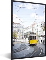 Fotolijst incl. Poster - Een gele tram met een kabelbaan rijdt door Lissabon - 60x90 cm - Posterlijst