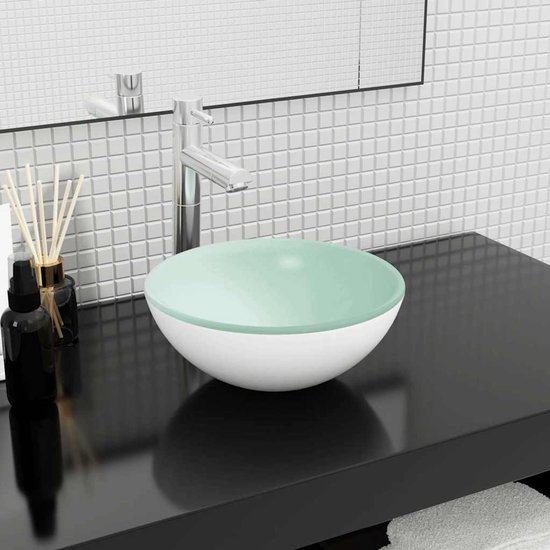 Lavabo rond en verre trempé, blanc avec intérieur vert clair.