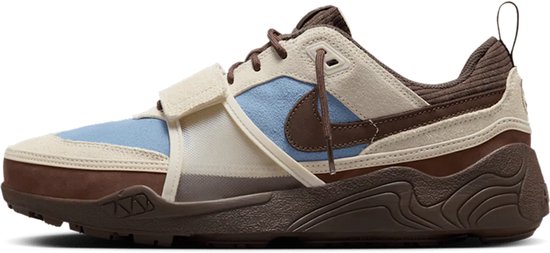 Lichtblauwe, beige en bruine sneaker met klittenbandsluiting en bruine zool.