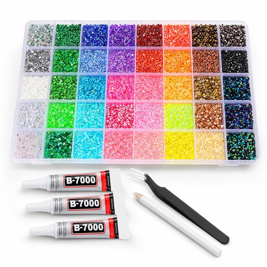 Opbergdoos met 40 vakjes gevuld met diverse kleuren strass steentjes, 3 tubes B-7000 lijm, pincet en waxpen.