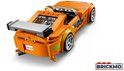 Oranje LEGO Toyota Supra MK4 met spoiler en groene graphics, vanuit een schuin bovenaanzicht.