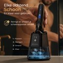 Man wordt geschoren door zwart scheerapparaat met reinigingsstation. Tekst: "Elke ochtend Schoon".