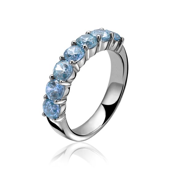 Bague en argent avec sept pierres rondes bleues.