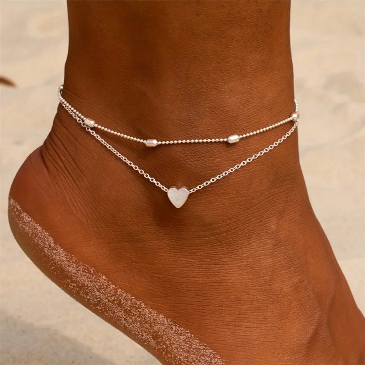 Aramat Jewels | Enkelbandjes | Stalen Enkelbandjes met Hartje en Kraaltjes Zilverkleurig | | | |3mm | Staal | Volwassenen | Verkleurd niet