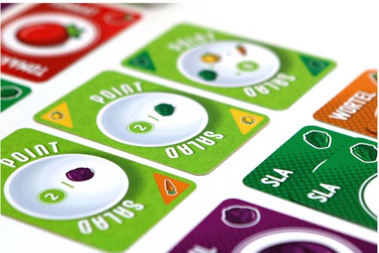 Kaartspel 'Point Salad' met groene kaarten met illustraties van sla, punten en een schaal.